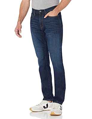 Amazon Essentials Vaqueros elásticos, Corte Holgado (Disponibles en Tallas Grandes) Hombre, Lavado Índigo, 46W / 28L